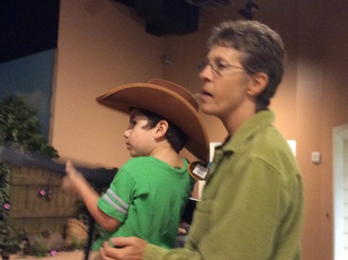 Teaching Grandma Lisa how it's done (target shooting)