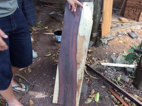 A rich red-purple vein that ould be polished and stained for a table or bench. 
