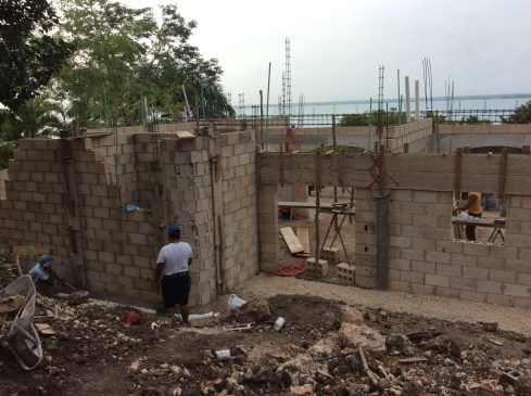 Rounding corners with concrete blocks.