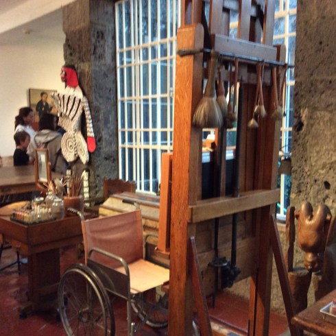 Brushes hung from the easel.