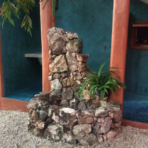 A fountain and pond on the north side of the house. 